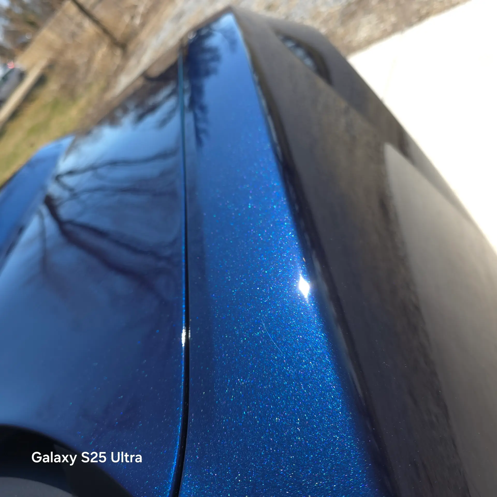 Close-up of hydrophobic water beading on ceramic coated paint
